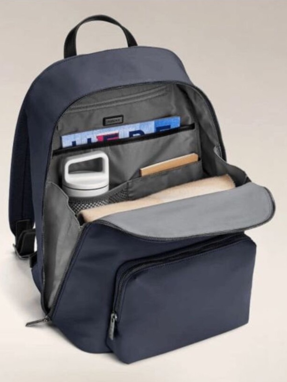 Away Navy Backpack with Front Zip Pocket